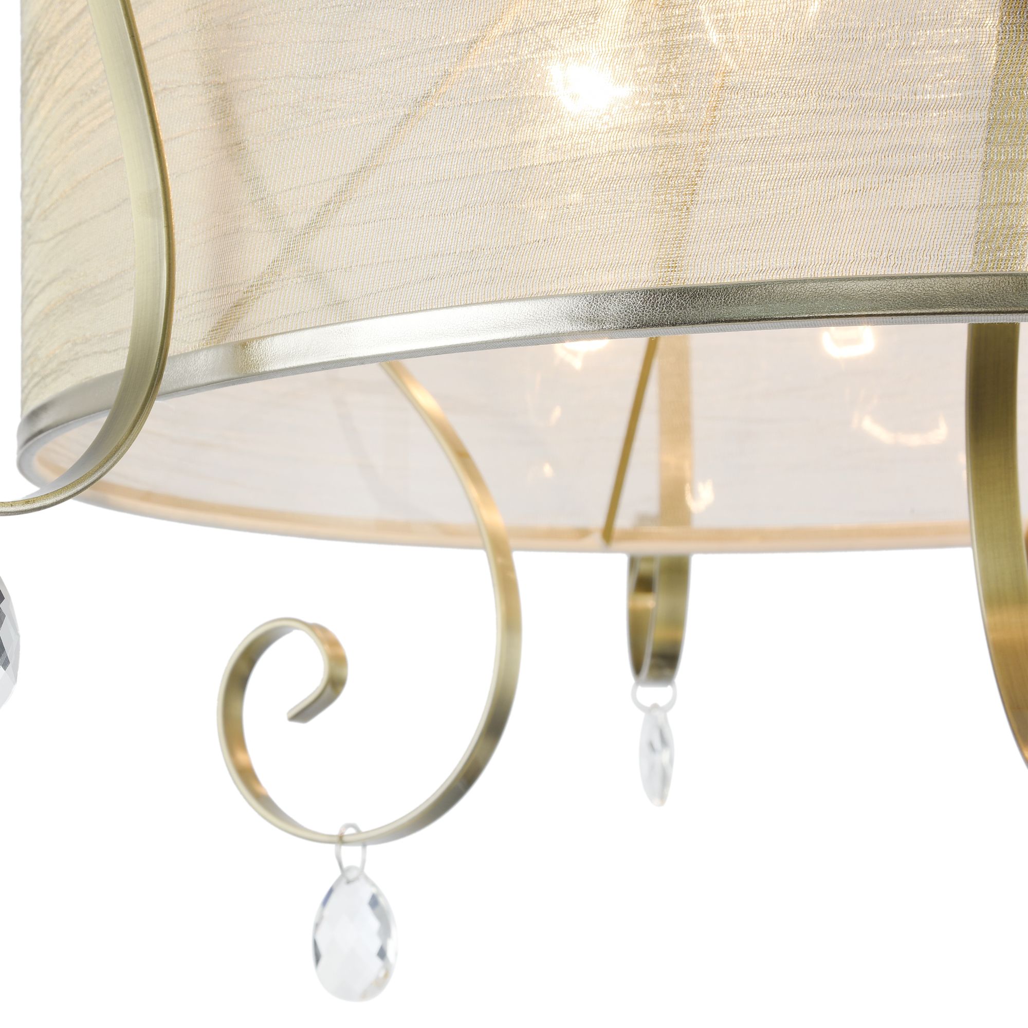 Светильники серии Simone выполнены в классическом стиле. Арматура цвета «античное серебро», абажуры из органзы на ПВХ. Люстры подходят для помещений с невысокими потолками благодаря конструкции «2 в 1». Дизайн изделий дополнен декоративными подвесками. Потолочный светильник Freya FR2020-CL-03-BZ — изображение 4